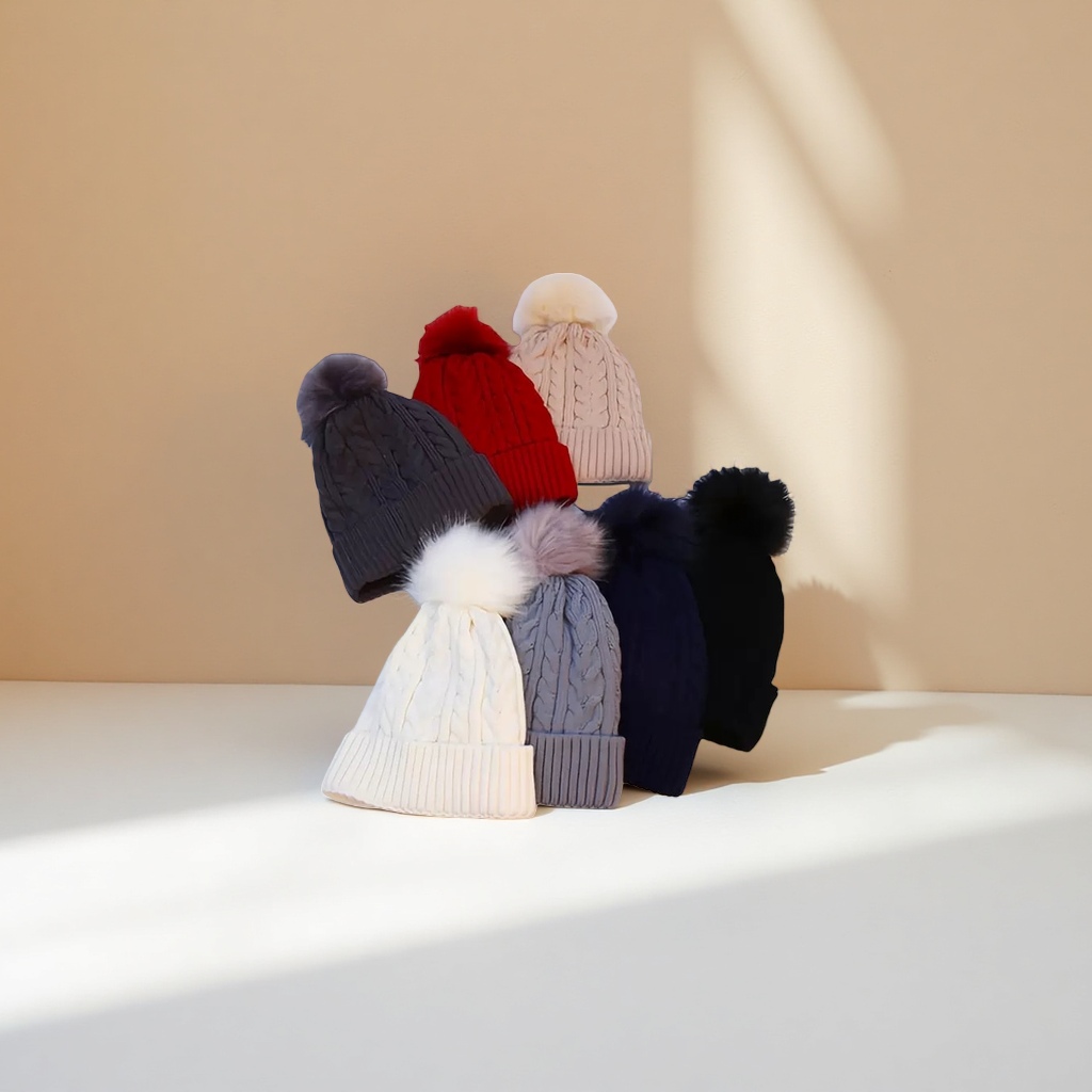 A multi-color knitted woolen cap with large wool ball decoration for warm winter knitted cap Specification image