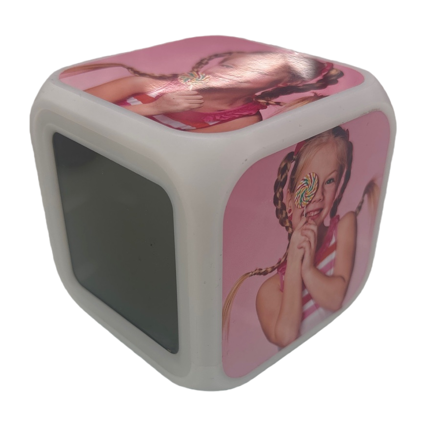 A white cubic alarm clock with a pattern of a girl eating lollipops, a silent bedside display in the bedroom, heat transfer printing Item Picture