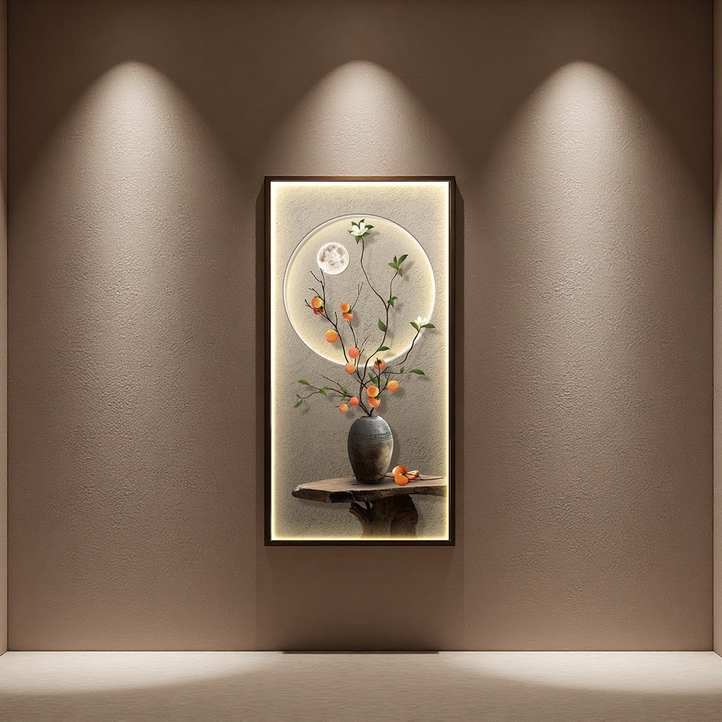 The glowing persimmon flower branches are placed in a clay pot, framed in a picture frame, with a round moon and green leaves as the background and a wooden table for decoration