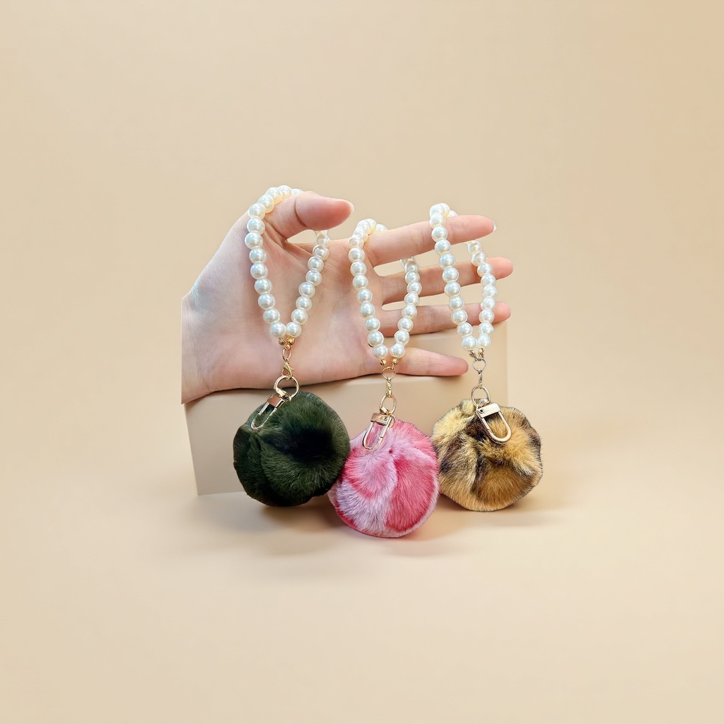 Three types of pearl bracelet pendants and plush ball keychains are cute accessories suitable for both men and women Specification image