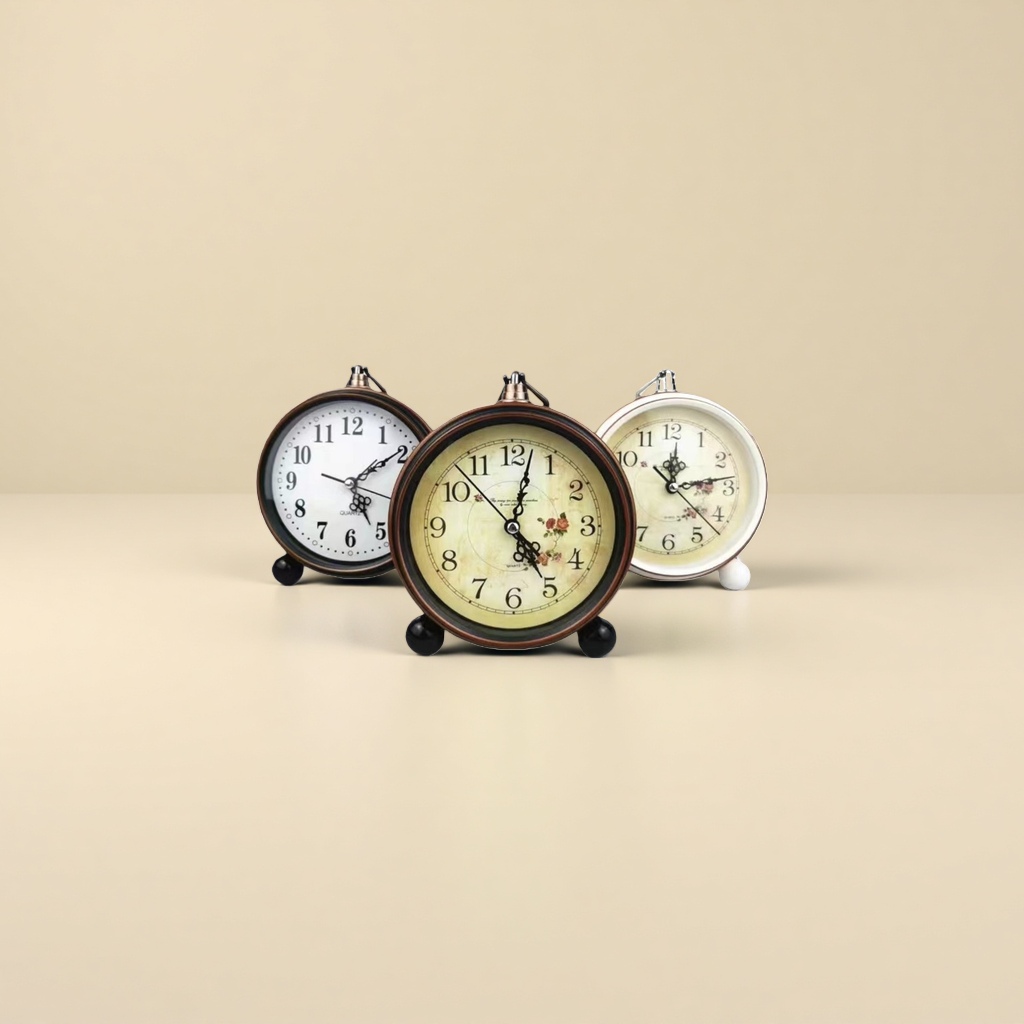The retro round bell table clock features three dial designs: beige rose pattern, white background with black characters and small flower patterns, copper frame and black base Application Scenario