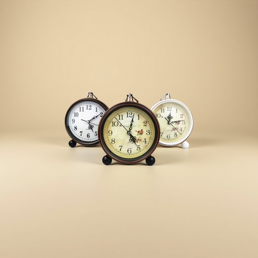 The retro round bell table clock features three dial designs: beige rose pattern, white background with black characters and small flower patterns, copper frame and black base Specification image