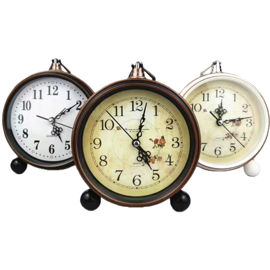 The retro round bell table clock features three dial designs: beige rose pattern, white background with black characters and small flower patterns, copper frame and black base Item Picture