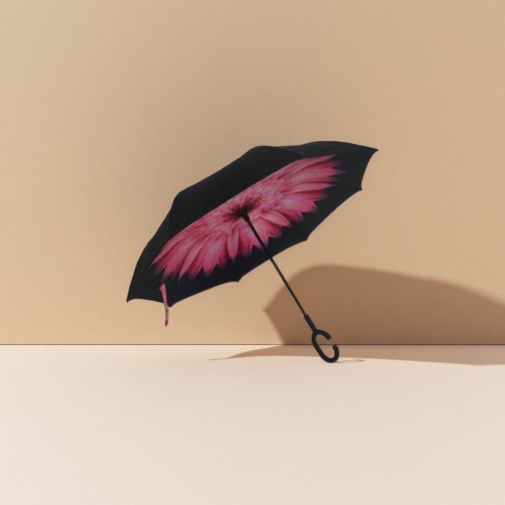 A reverse umbrella with a black canopy and pink flower patterns Specification image