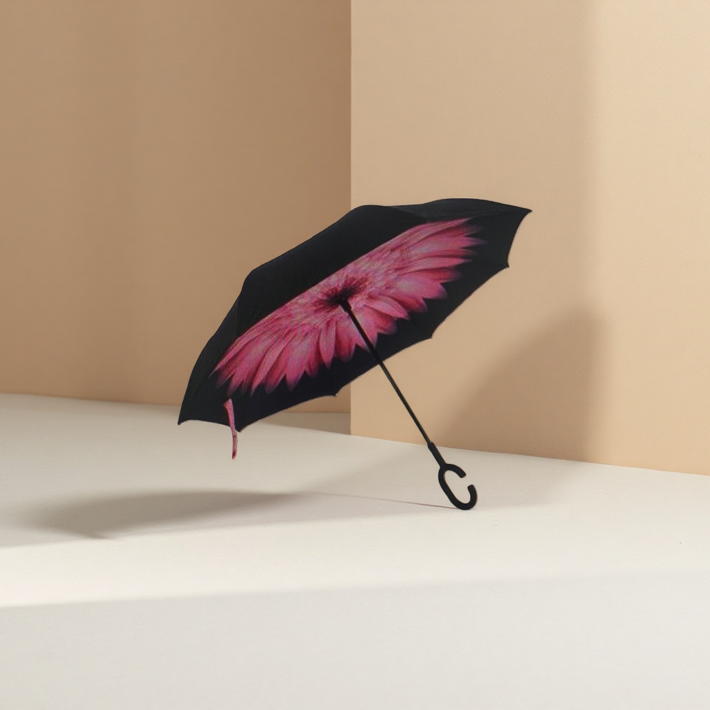 A reverse umbrella with a black canopy and pink flower patterns Application Scenario