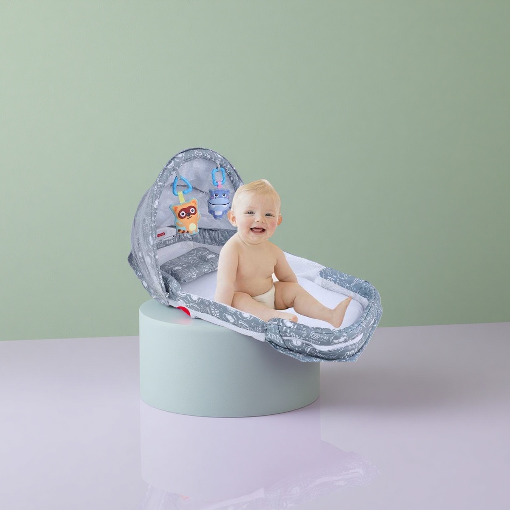 The grey portable folding crib with a built-in smiling baby pattern is lightweight and easy to store details Picture