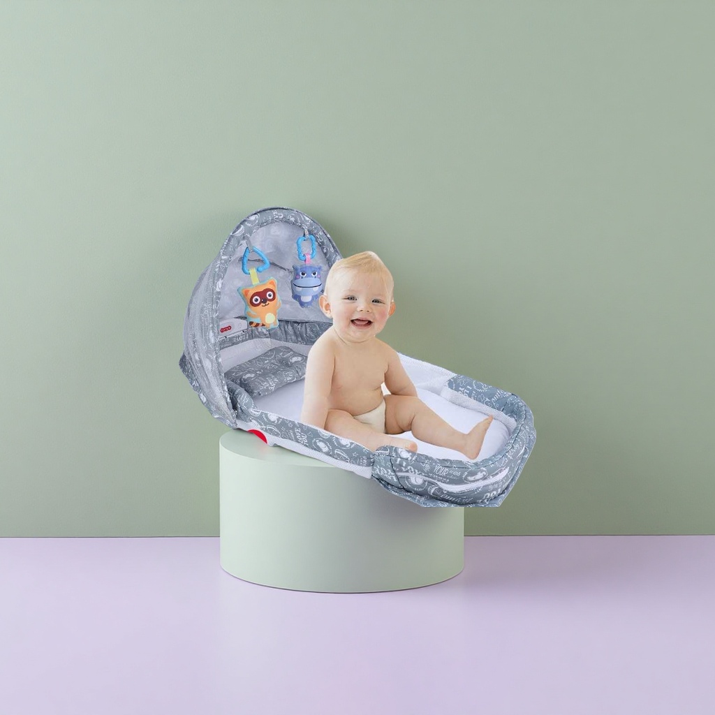 The grey portable folding crib with a built-in smiling baby pattern is lightweight and easy to store Application Scenario