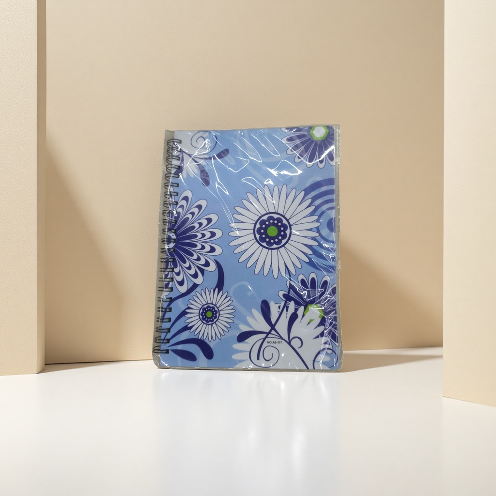 A high-quality student office notebook with blue floral pattern spiral-bound pages and inner pages made of kraft paper Application Scenario