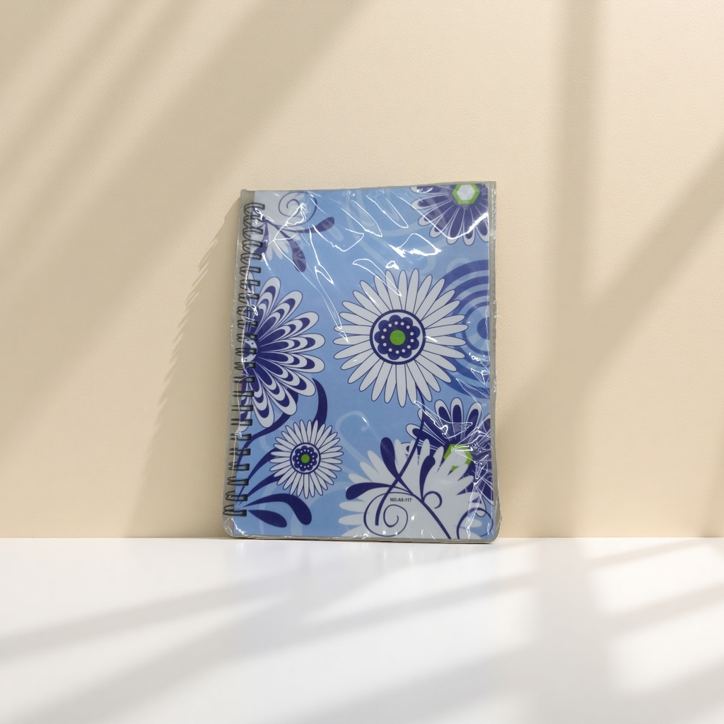 A high-quality student office notebook with blue floral pattern spiral-bound pages and inner pages made of kraft paper details Picture