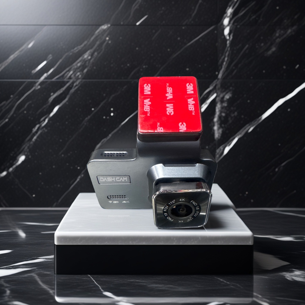 The black dashcam has a red 3M VHB double-sided tape patch on the top Application Scenario
