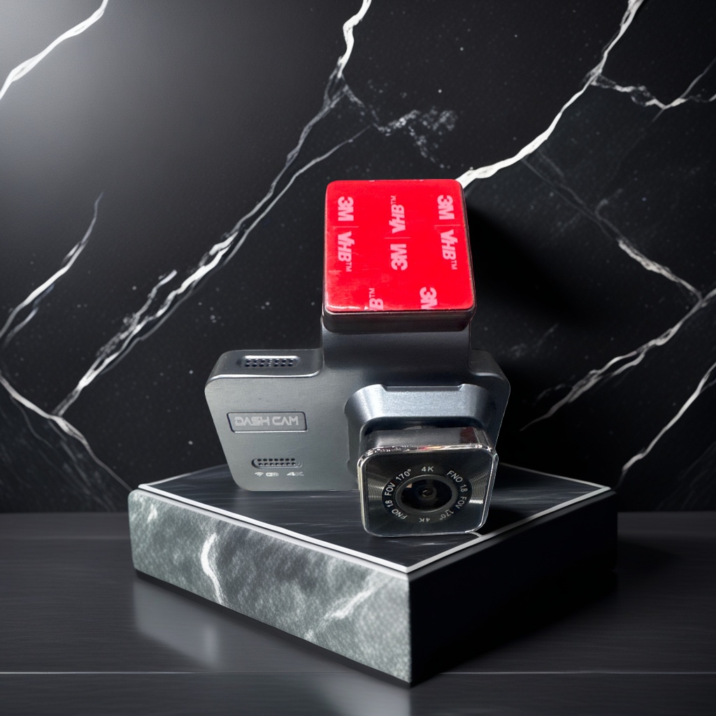 The black dashcam has a red 3M VHB double-sided tape patch on the top details Picture