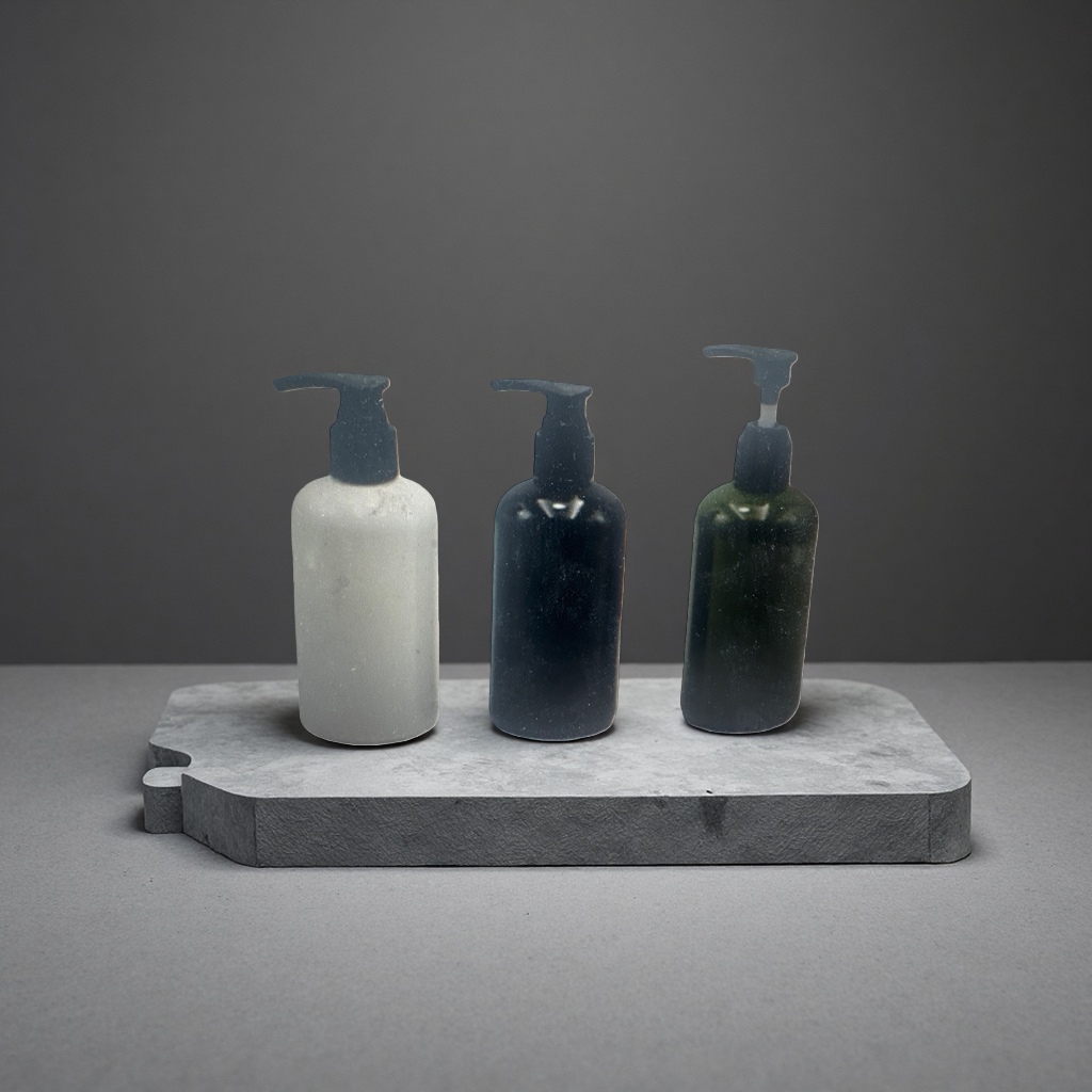 Three-bottle press-type container, with matte white, black and green bottle bodies and black pump heads Application Scenario