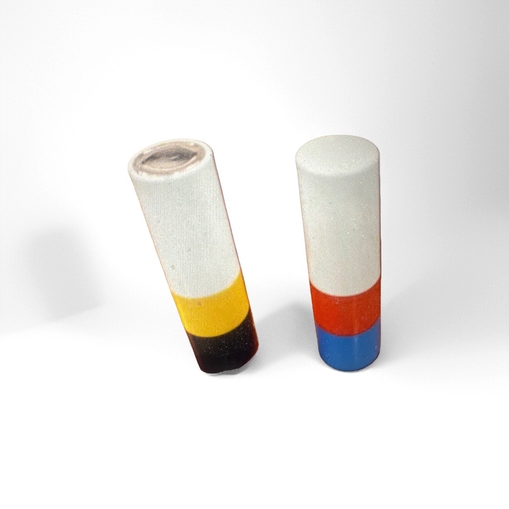 The white cylinder has a yellow and black two-color ring on the left and a red and blue two-color ring on the right