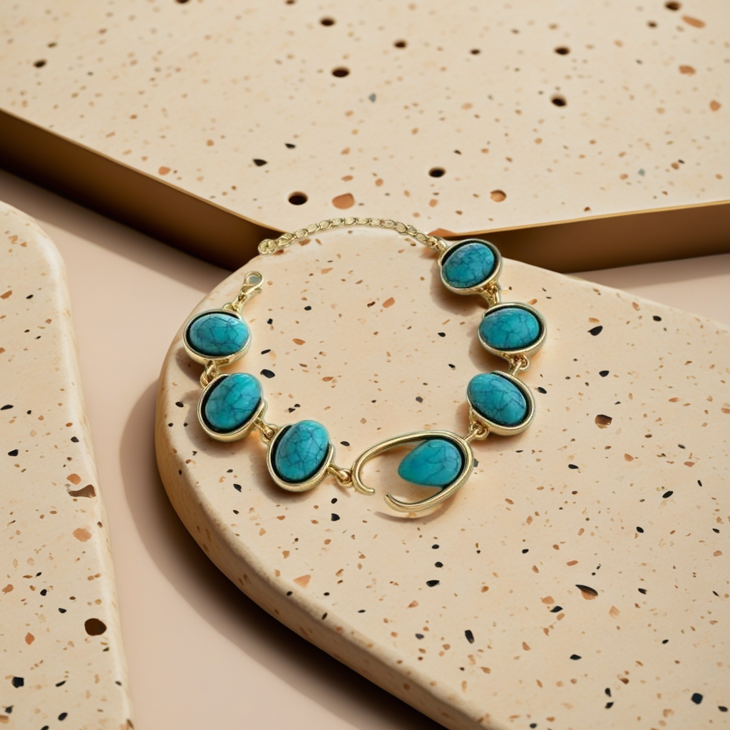 A still life photo display of a golden turquoise bracelet and a white plate Application Scenario