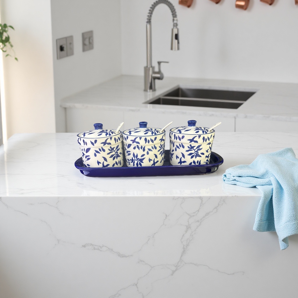 A three-piece set of blue and white leaf-patterned ceramic seasoning jars with a blue tray Application Scenario