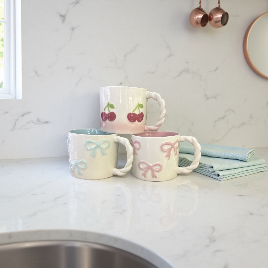 White ceramic cups with bow decoration and twisted rope handles, ceramic cups, water cups and mugs Application Scenario