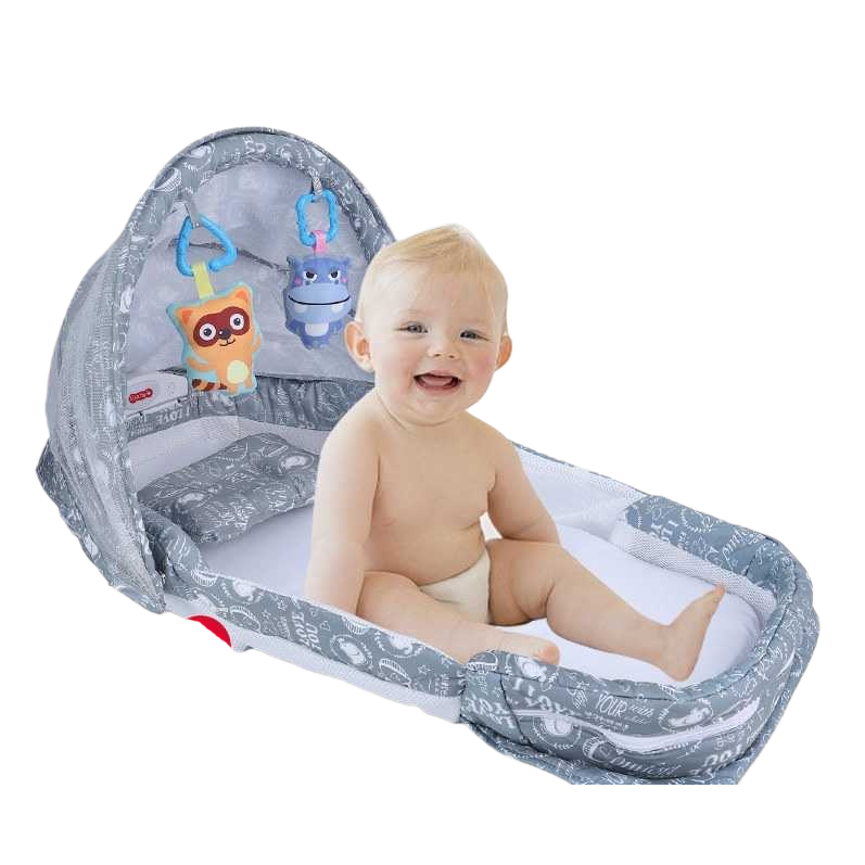 The grey portable folding crib with a built-in smiling baby pattern is lightweight and easy to store Item Picture