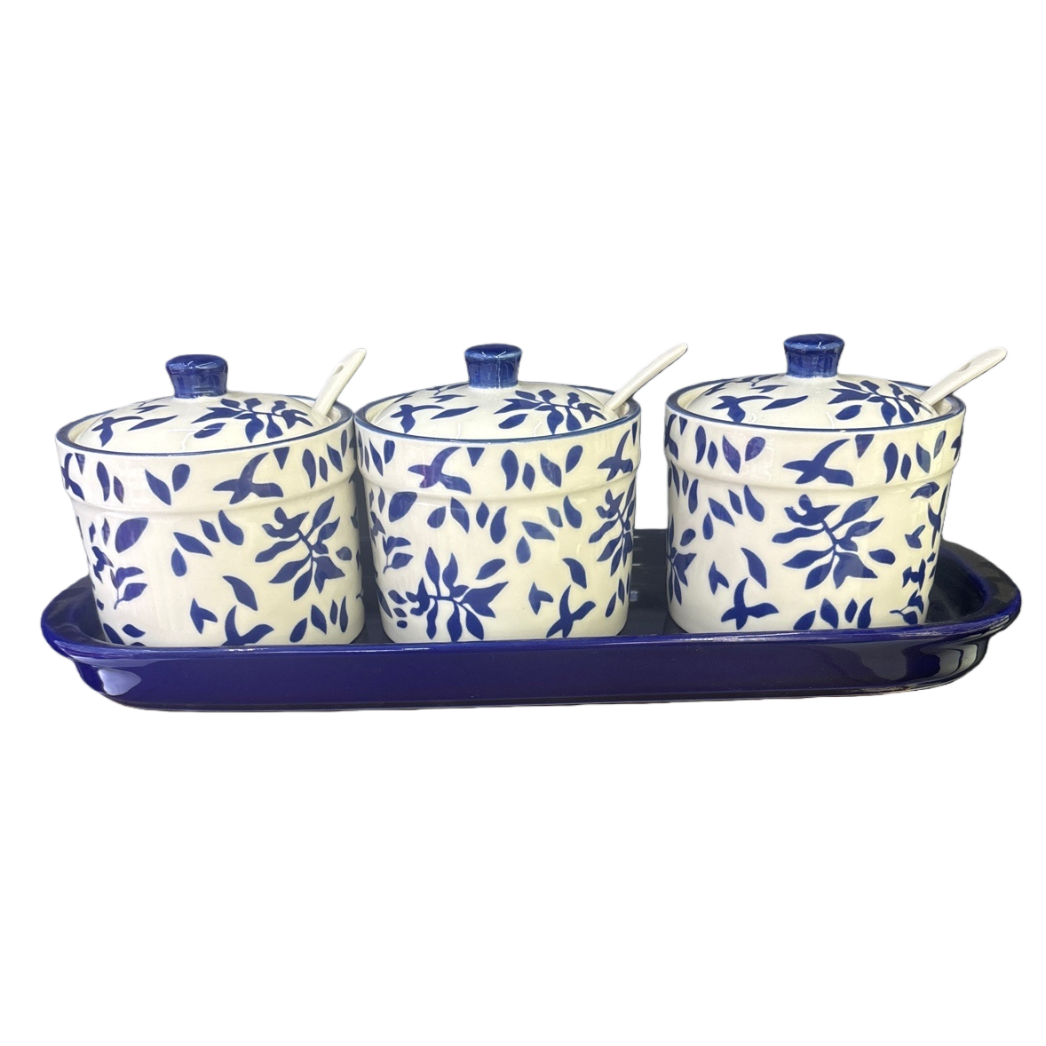 A three-piece set of blue and white leaf-patterned ceramic seasoning jars with a blue tray Item Picture