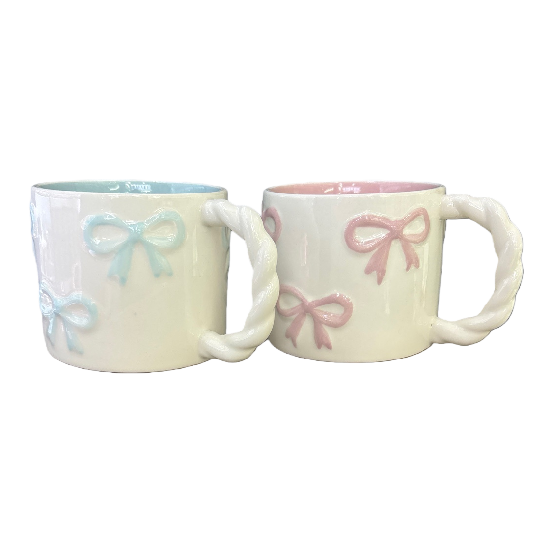 White ceramic cups with bow decoration and twisted rope handles, ceramic cups, water cups and mugs Item Picture
