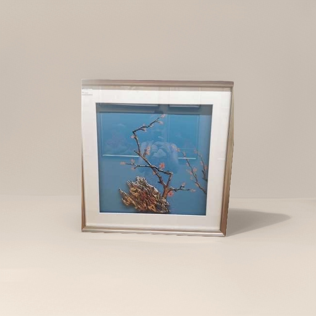 蓝色背景刺绣梅花枝干与山石装饰画细节图