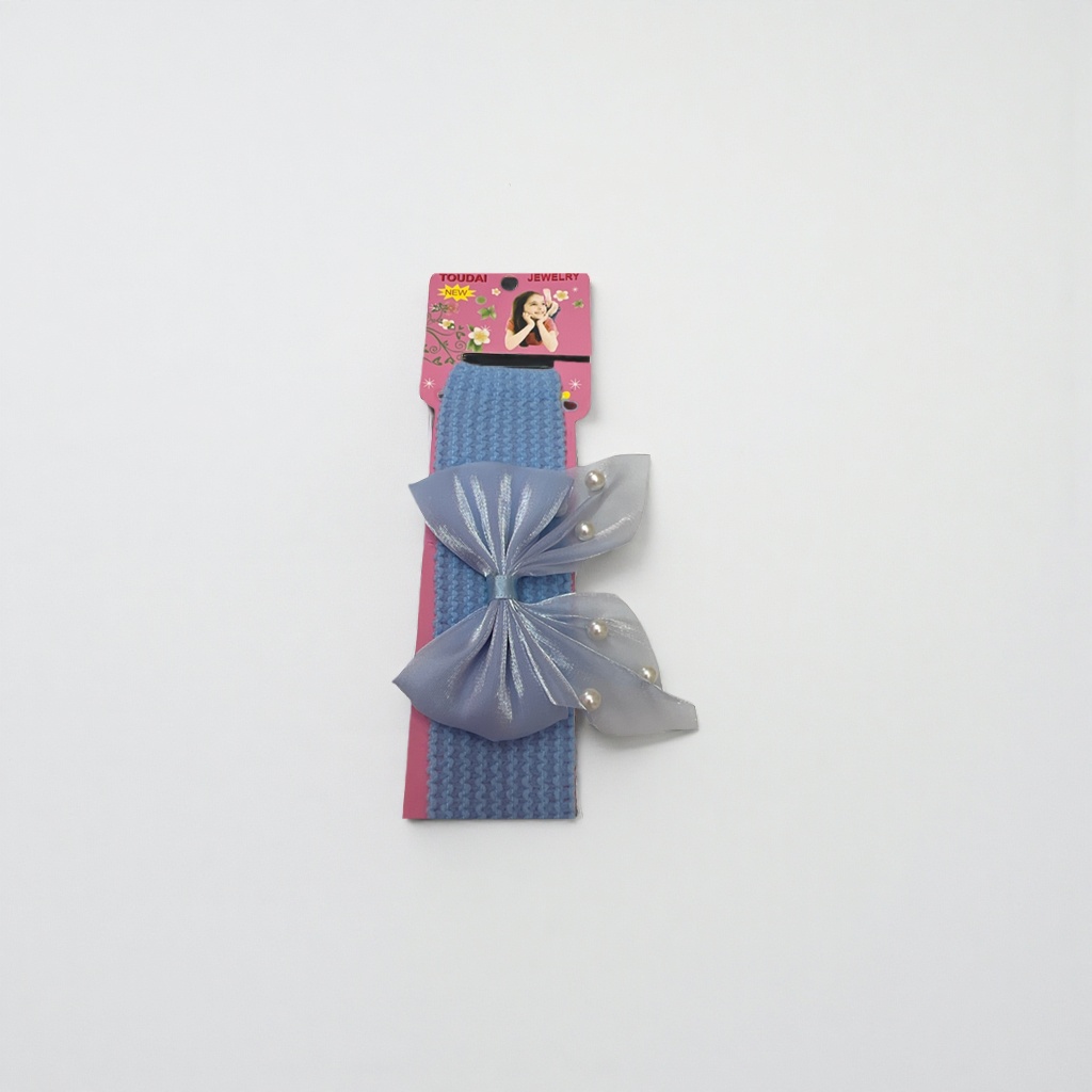 A fashionable and versatile adult headpiece for girls decorated with a blue hair band and pearl bows Application Scenario