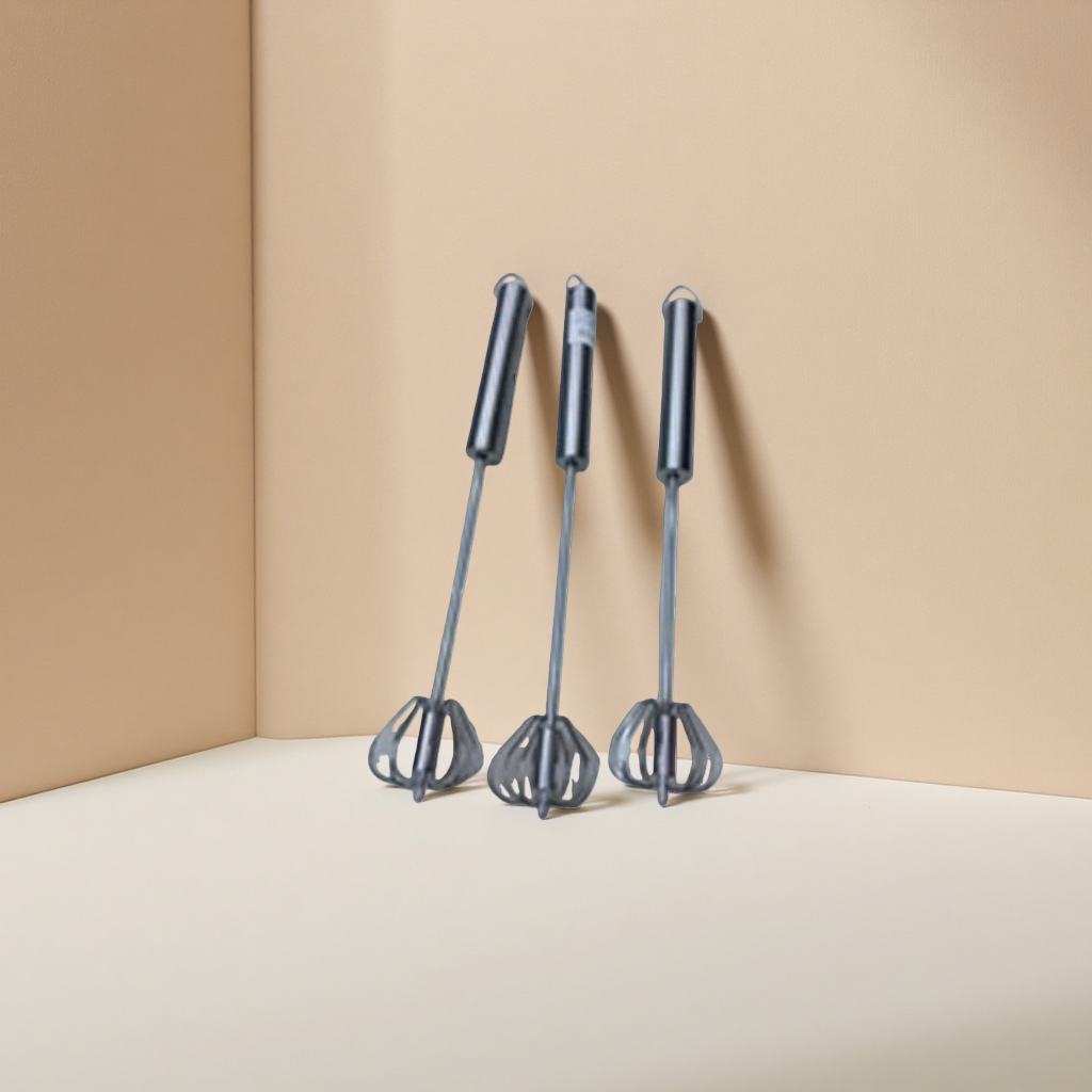 Silver stainless steel egg beater, manual mixer, kitchen baking tool Application Scenario