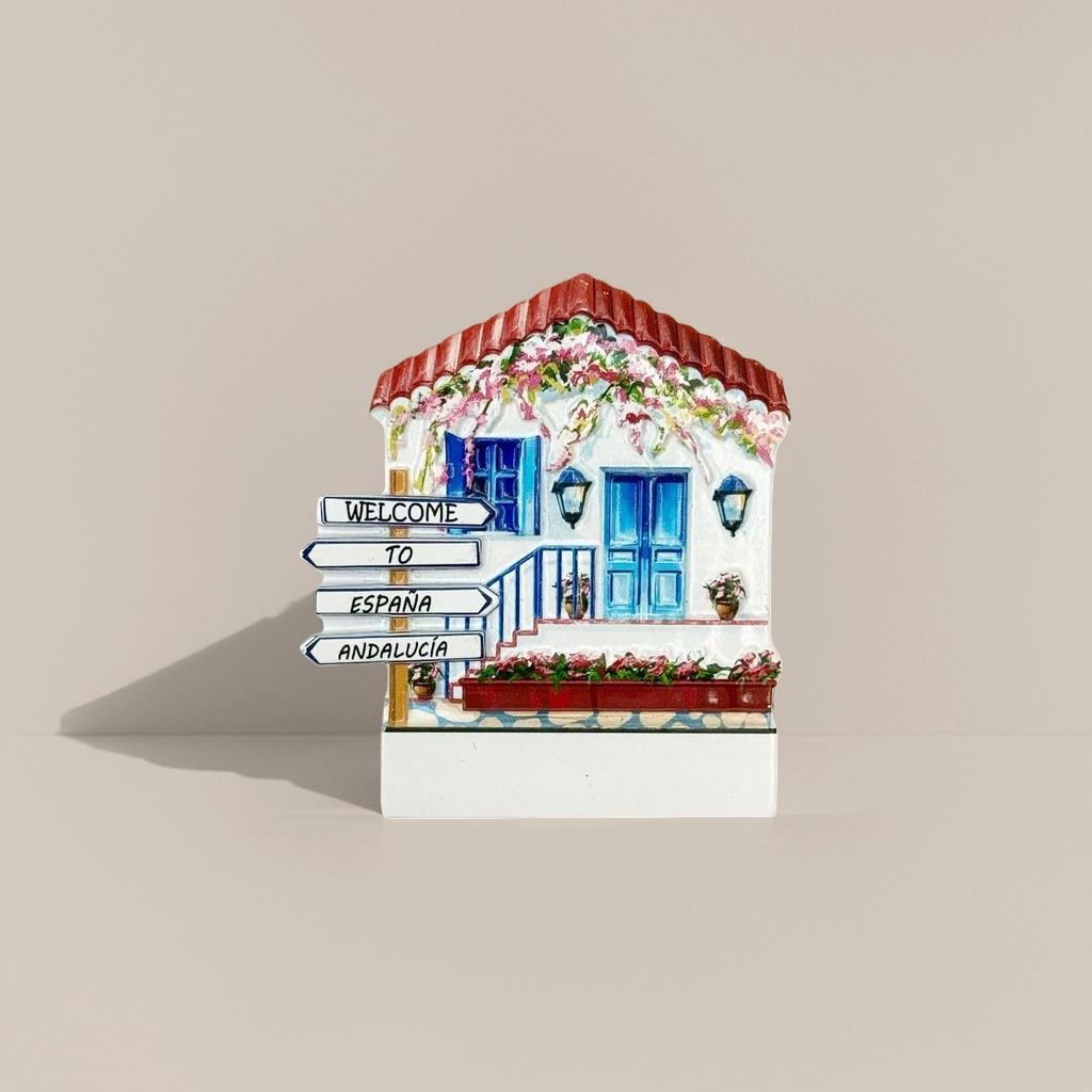 Colorful house-shaped fridge magnets, blue doors and Windows, red roof, floral decorations, WELCOME TO ESPANA ANDALUCIA road signs Application Scenario