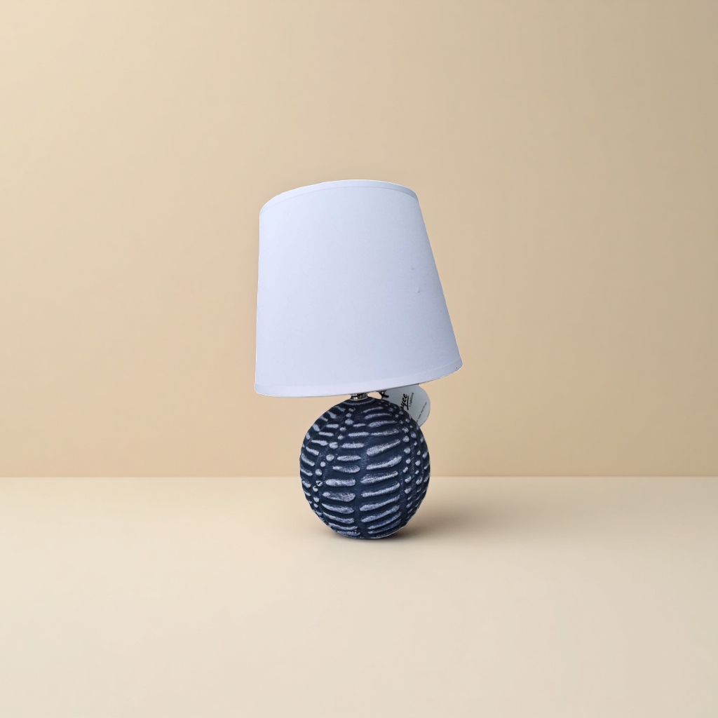 A table lamp with a white lampshade and a deep blue textured spherical base Specification image