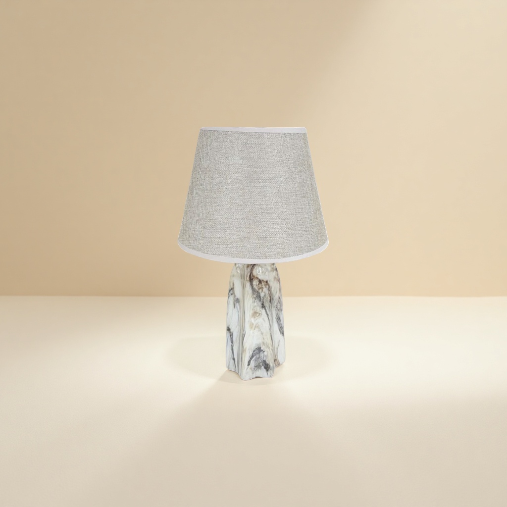A beige fabric lampshade paired with a marble-patterned lamp base table lamp Application Scenario