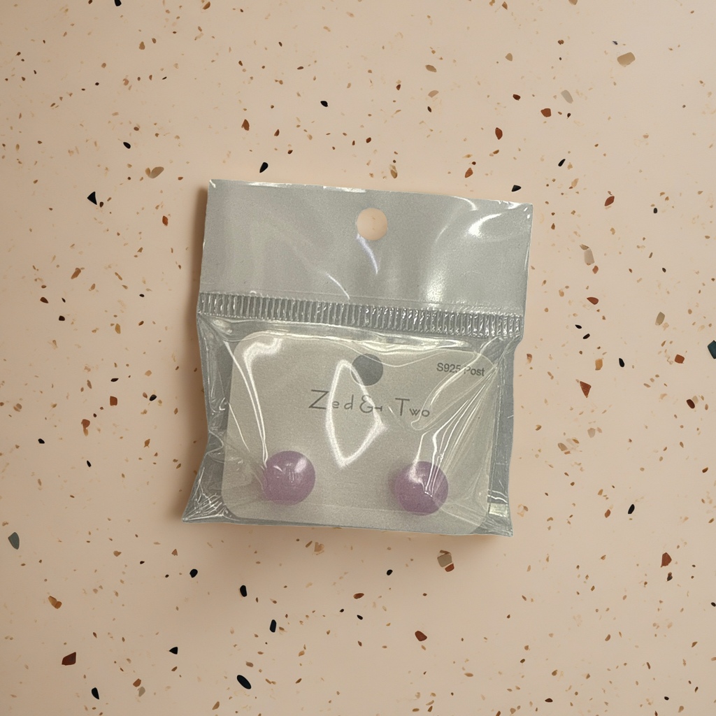 Zed & Two purple round stud earrings are packaged in transparent plastic bags Application Scenario