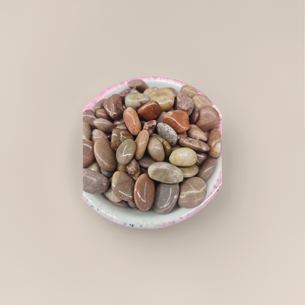 Colorful lace bowls hold various smooth pebble decorative ornaments details Picture