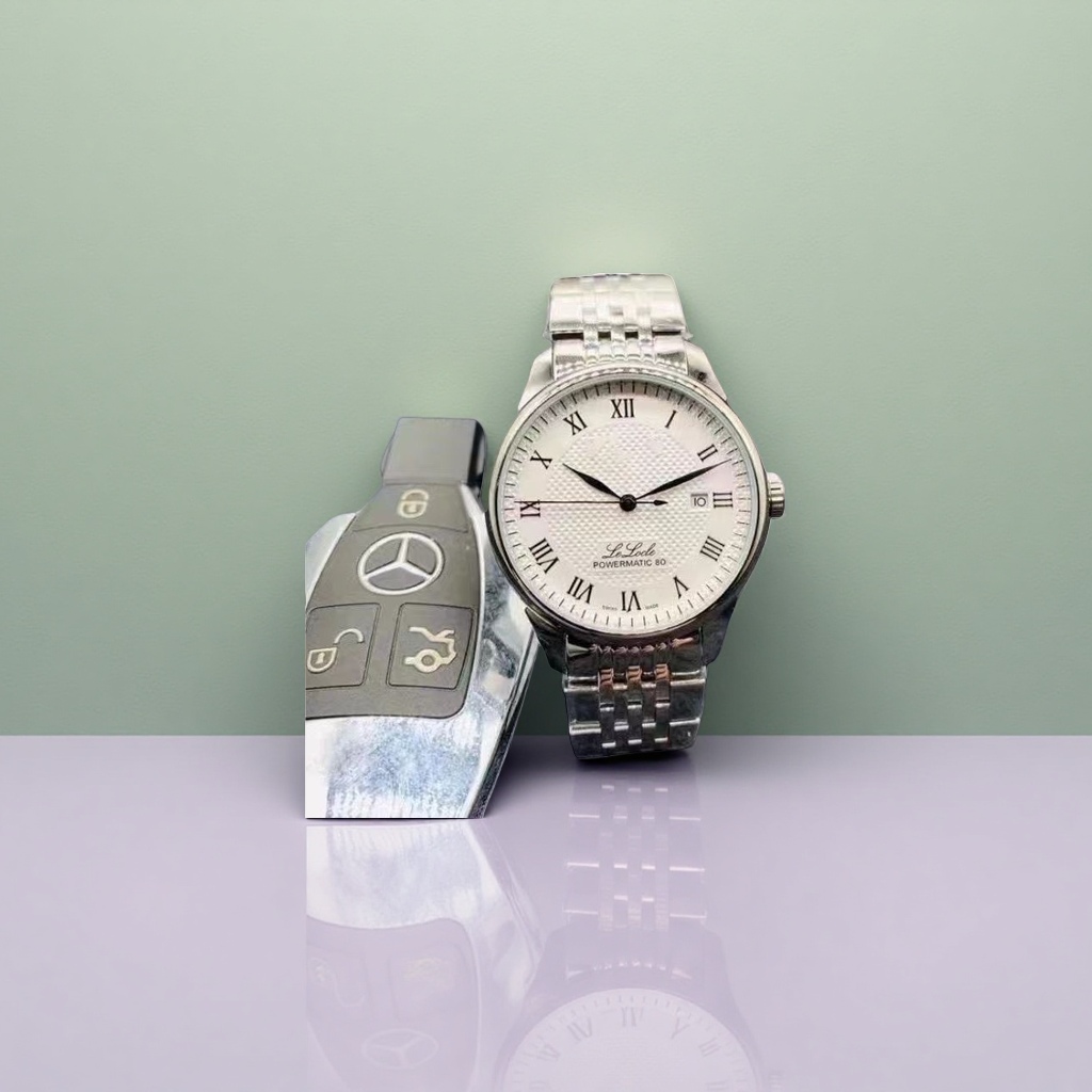 A simple, fashionable and lightweight quartz ladies' watch with a silver strap and white dial details Picture