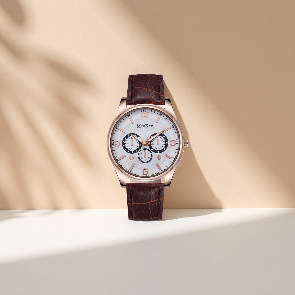 Men's watch with brown leather strap, rose gold case and white dial details Picture