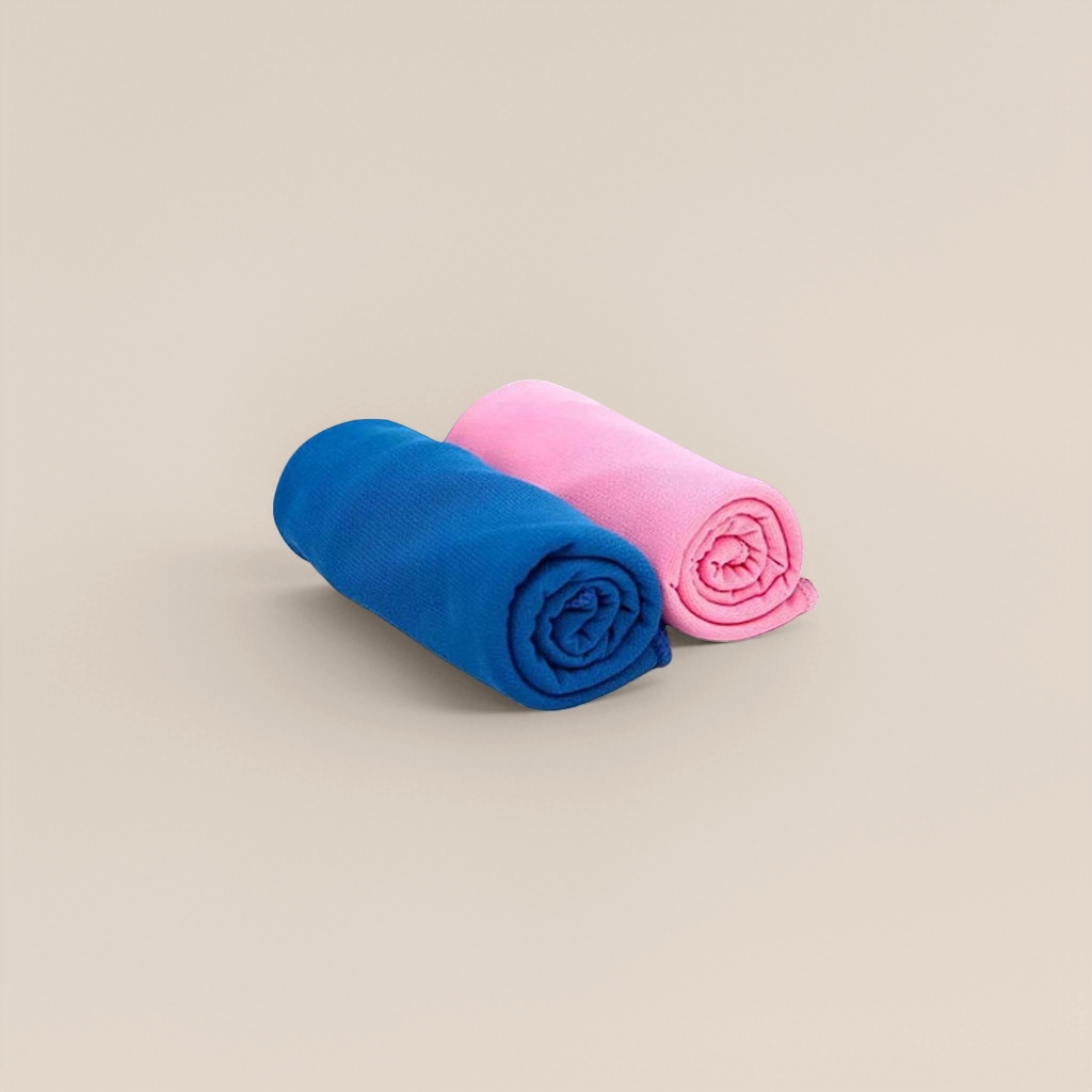 The blue and pink rolled-up towel with ice cubes and water splashes is designed to absorb water and dry quickly for the bathroom