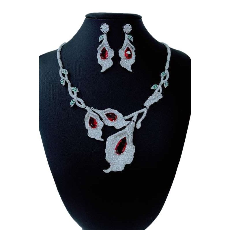Silver diamond-encrusted red and green gemstone leaf-shaped necklace and earring set Item Picture