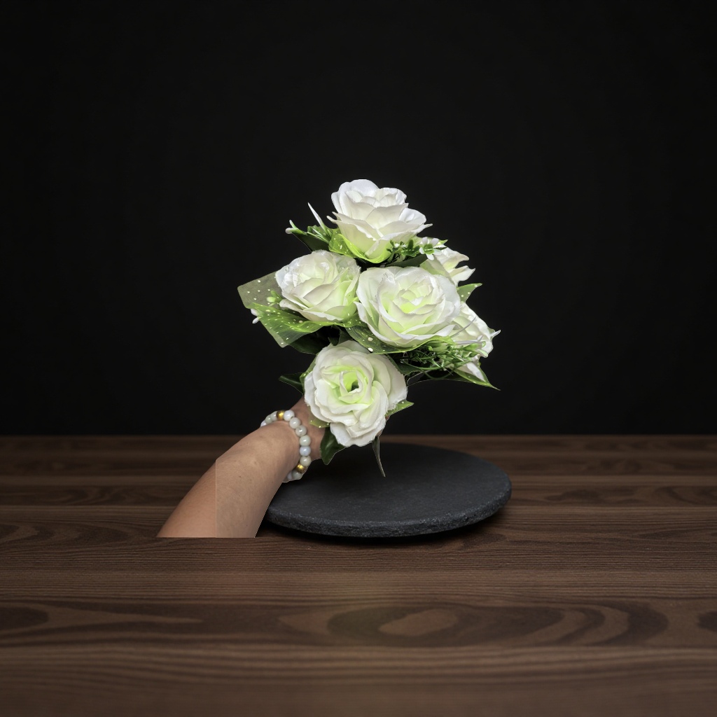A white artificial rose bouquet simulating preserved flowers for wedding decoration and living room ornaments
