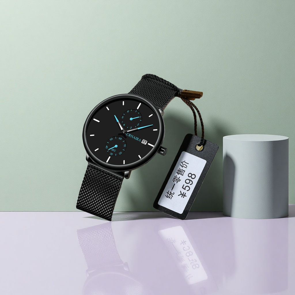 The watch features a black dial with a metal mesh strap and is packaged in a beige leather box Specification image