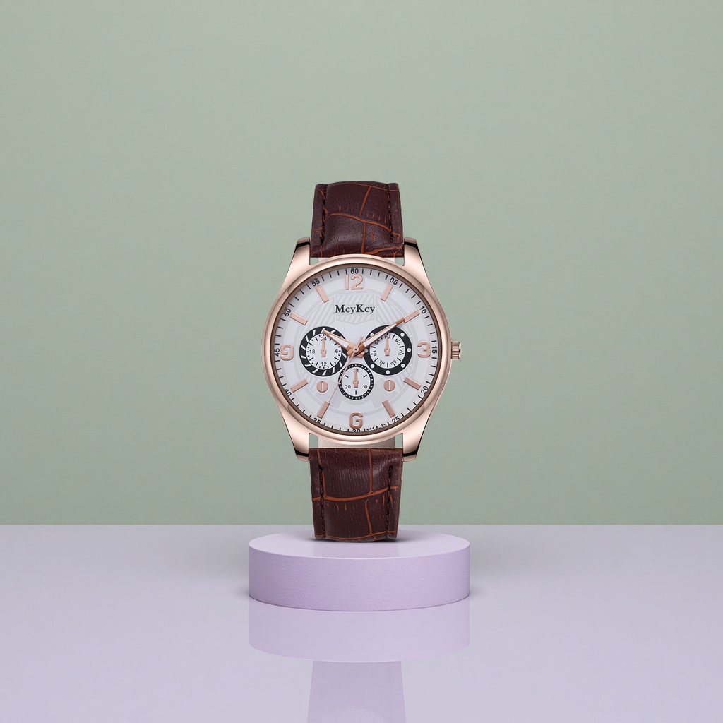 A ladies' watch with a brown leather strap, rose gold case and white dial details Picture