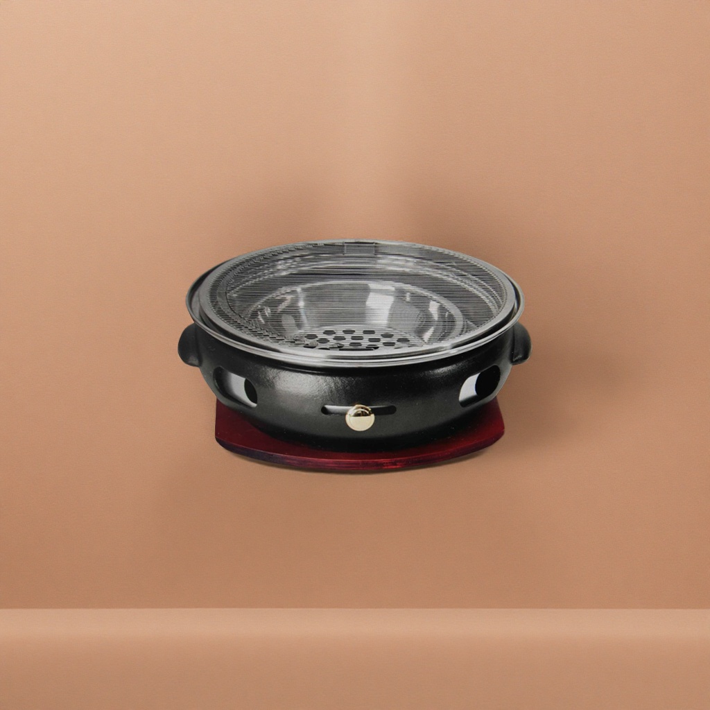 Horno de hierro fundido negro con tapa de rejilla metálica base roja horno doméstico