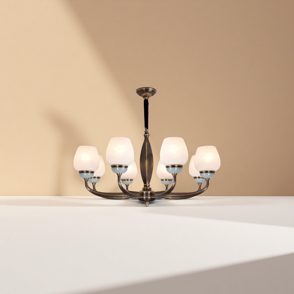 A bronze-colored chandelier with a milky white frosted glass lampshade and a light cyan base details Picture