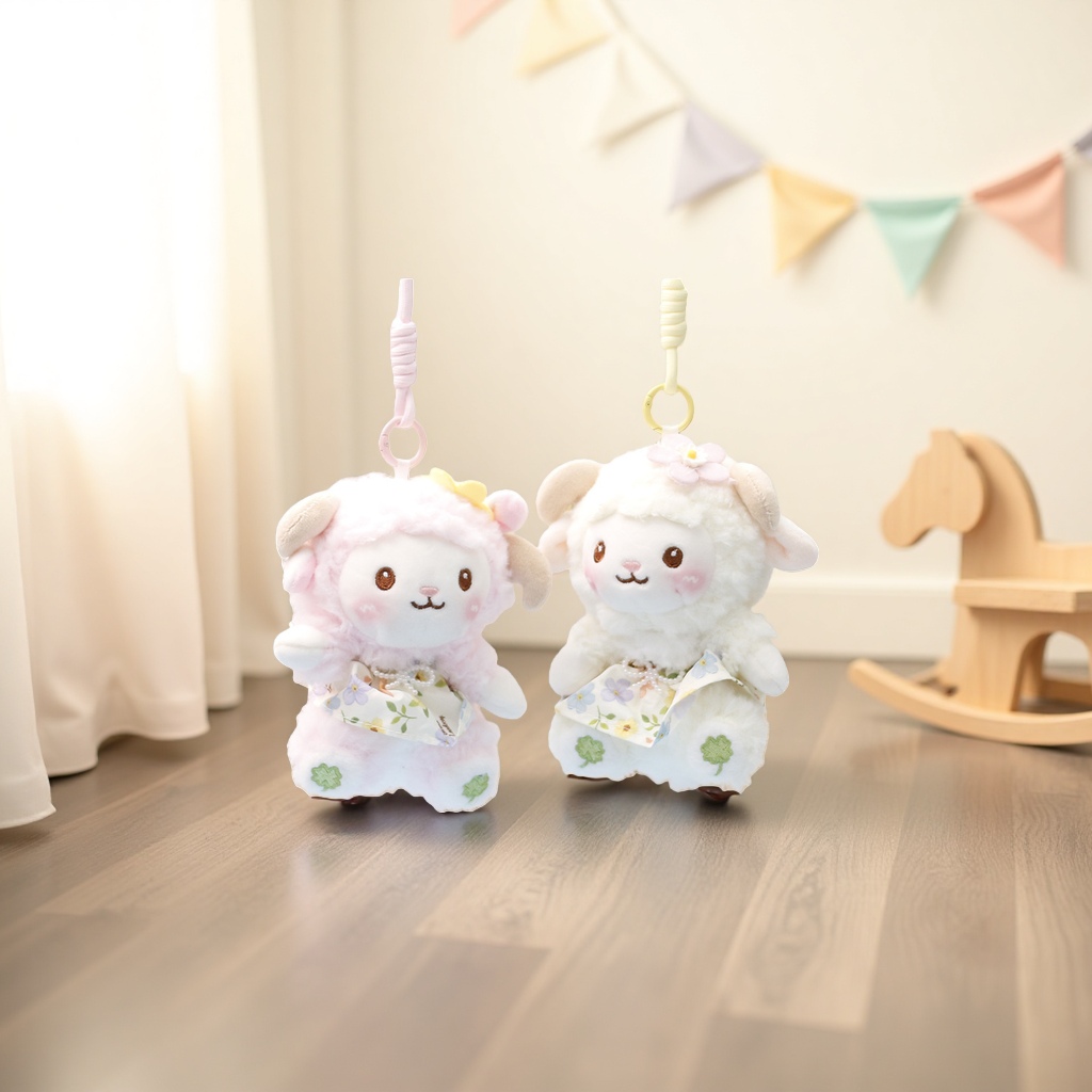 A cute and adorable pink and white plush little lamb pendant for car bags
