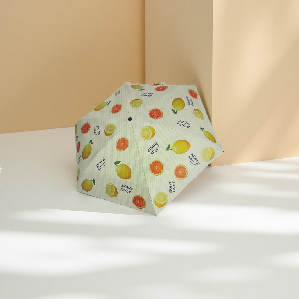 Patrón de fruta amarillo claro sol y lluvia paraguas de doble uso impermeable protección solar ligero plegable Application Scenario