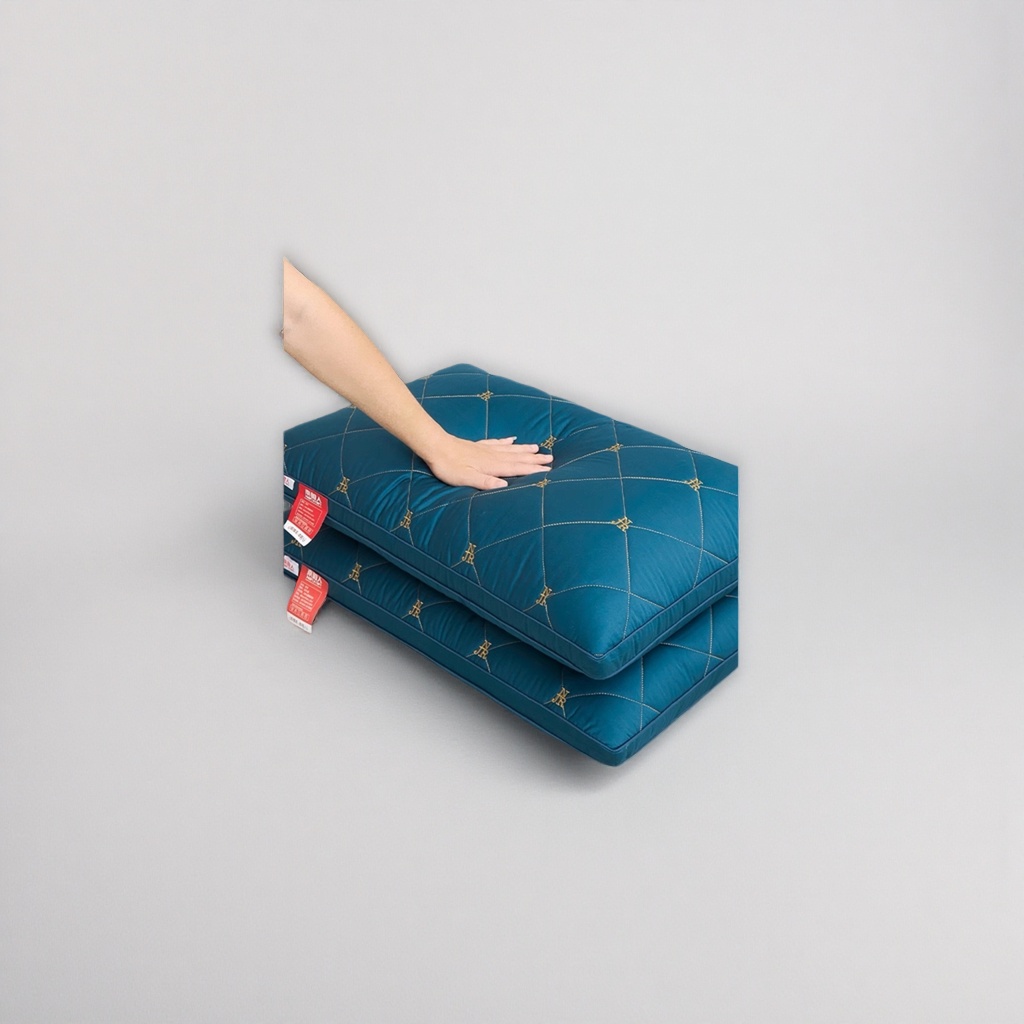 The deep blue diamond-patterned high-elastic and fluffy pillow shows its rebound effect when pressed by hand Specification image