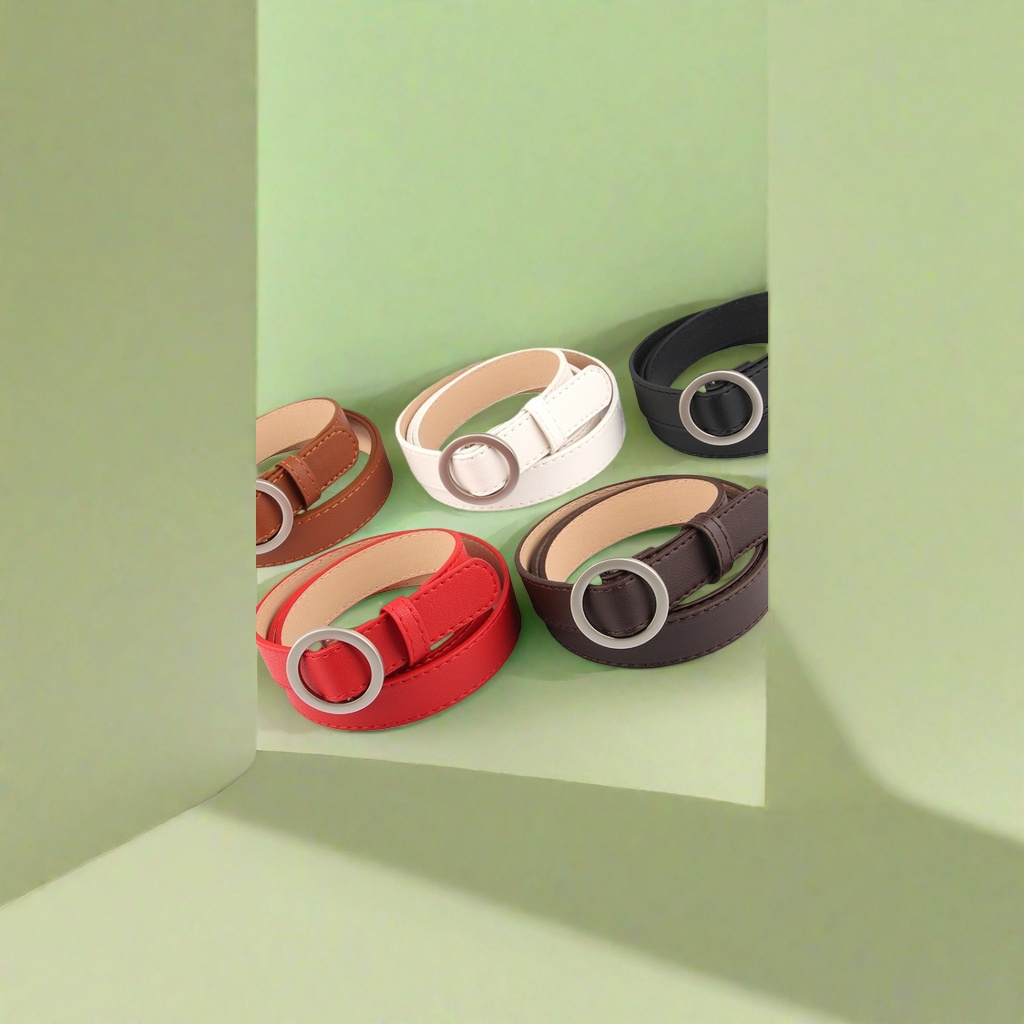 A simple and versatile men's belt with a round buckle in color and genuine leather details Picture