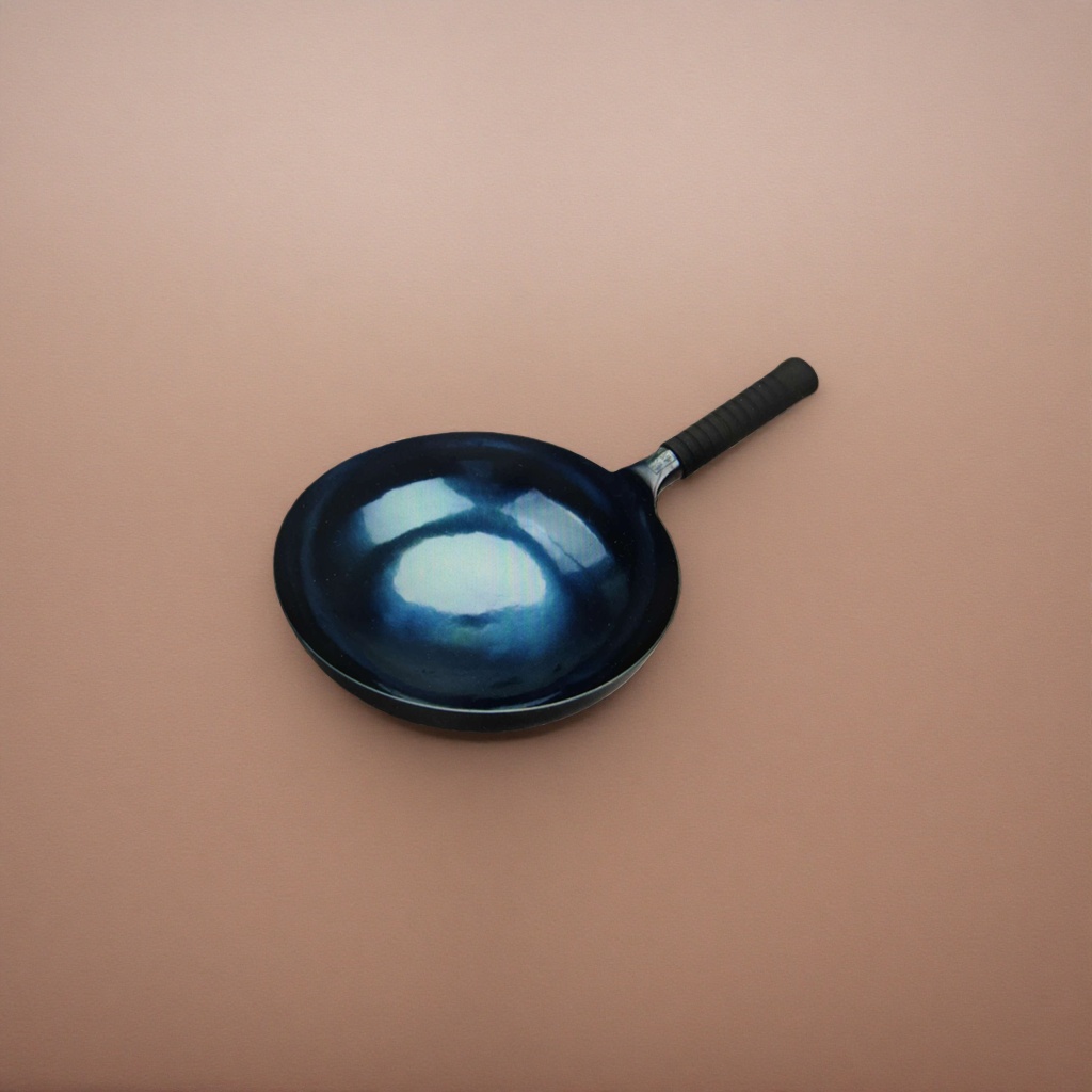 A dark blue non-stick wok for household frying, stir-frying, stewing and boiling details Picture
