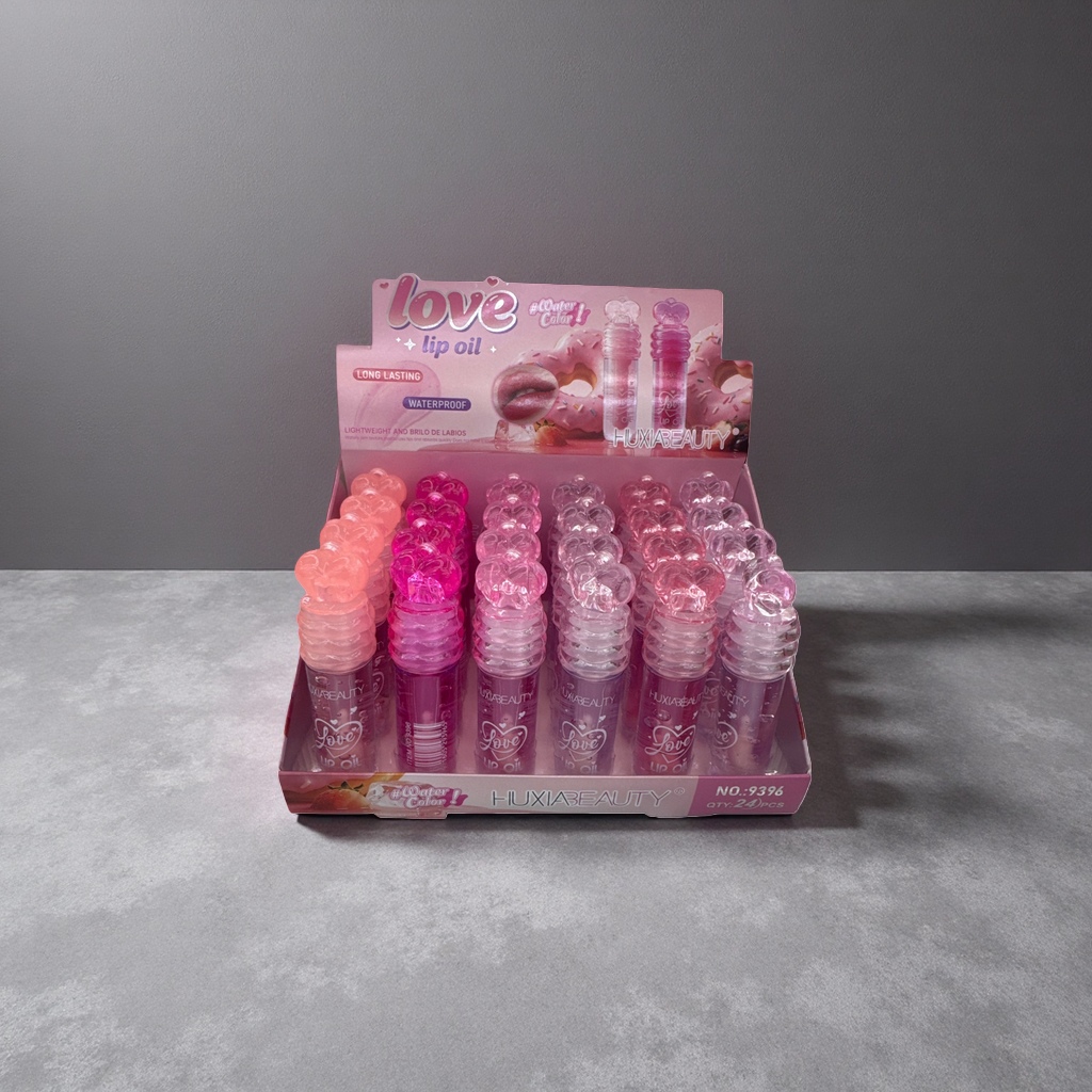 Pink heart-shaped bottle cap lip oil display stand, acrylic desktop storage stand, cosmetics display stand Application Scenario