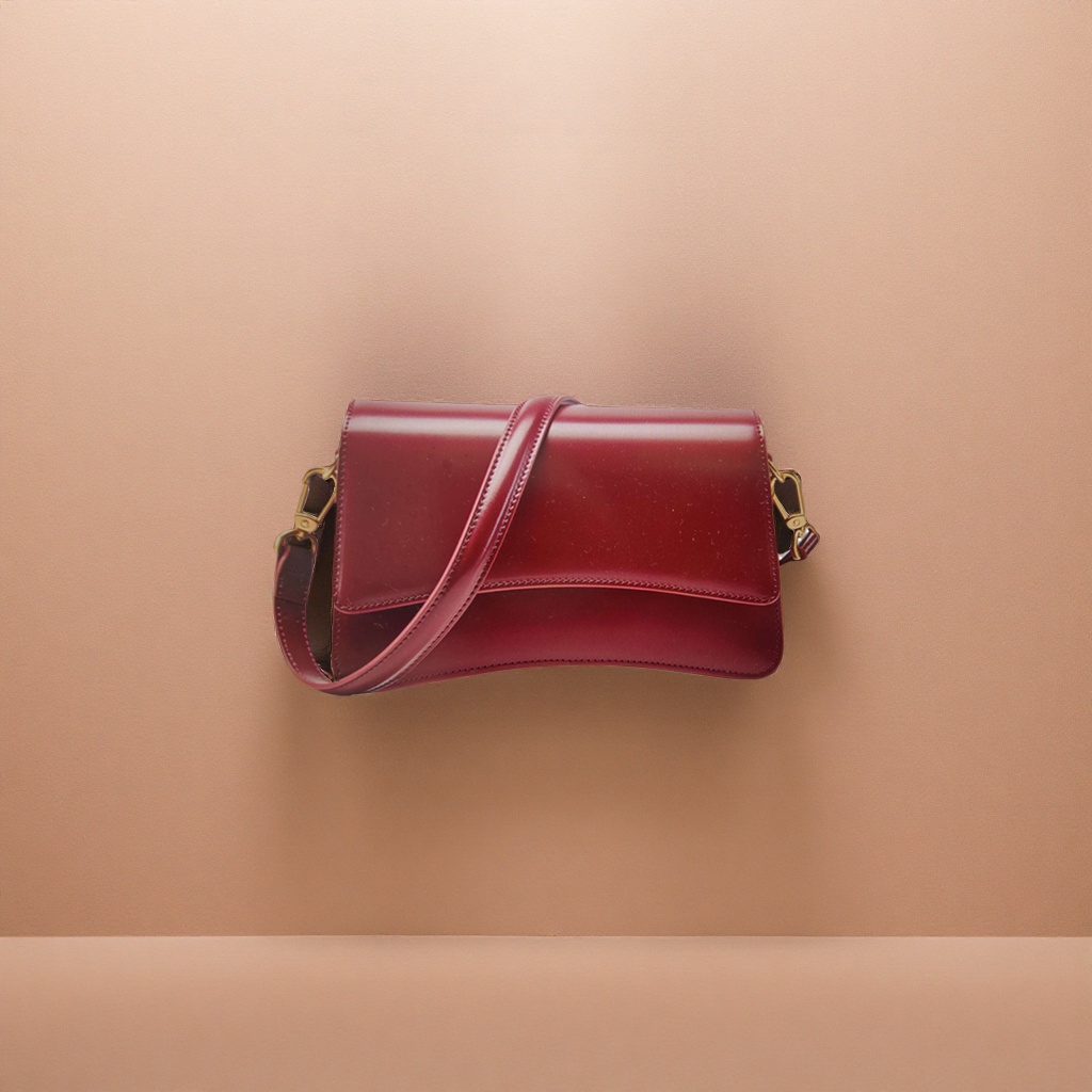 A wine-red leather crossbody bag, a versatile and fashionable single-shoulder bag for women