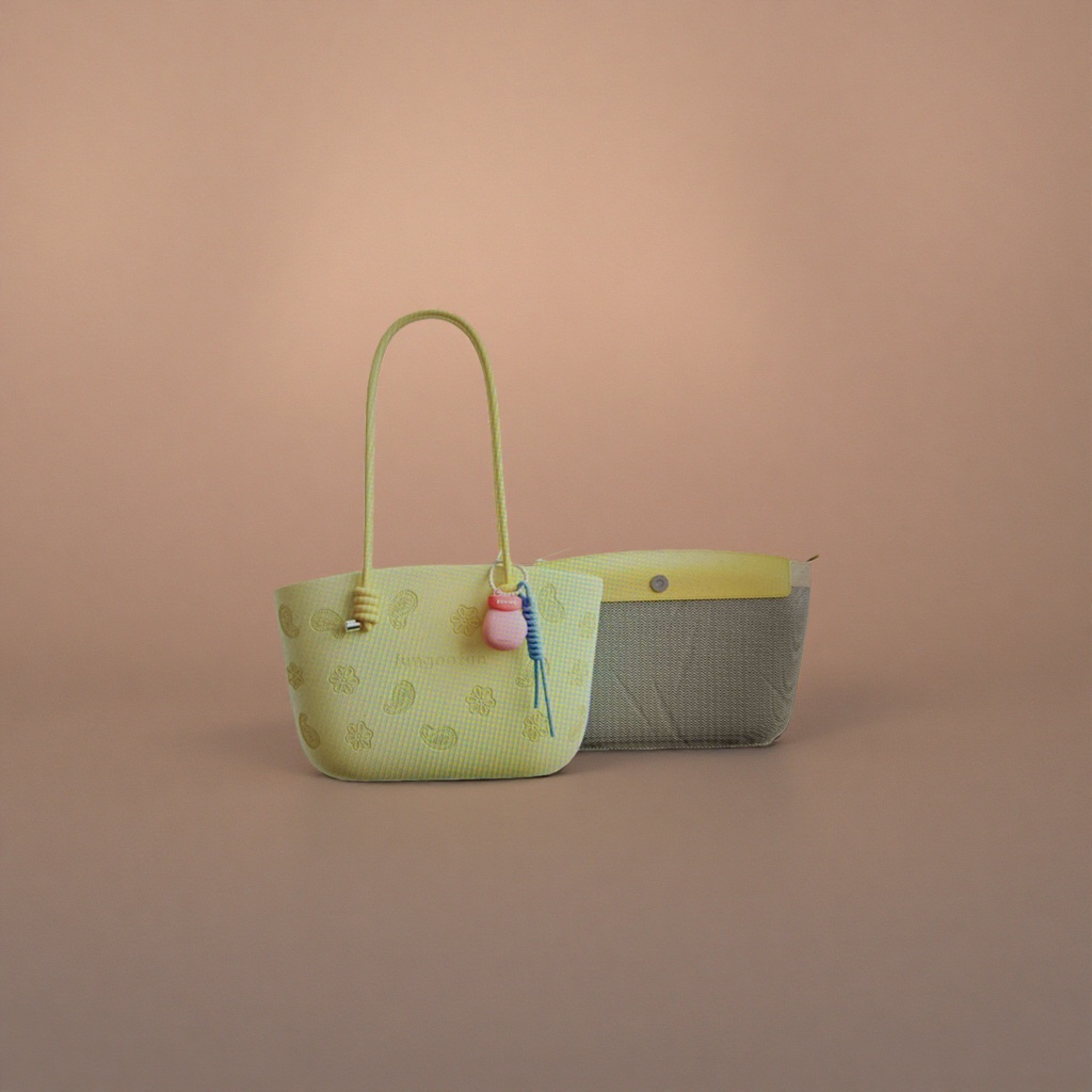 Yellow handbag with Paisley embossing of flowers, pink gourd pendant, blue spiral rope and grey wavy lining Specification image