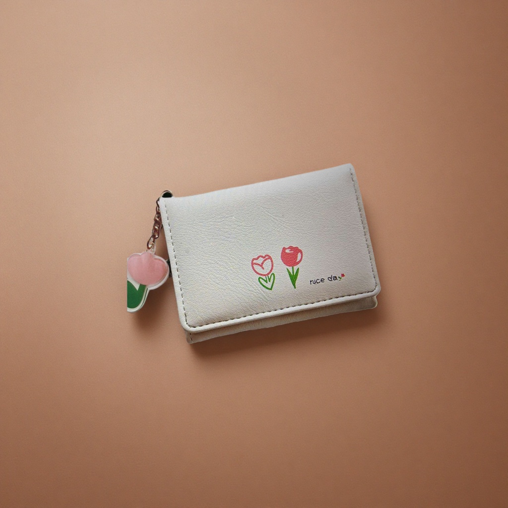 A small white wallet is printed with two red tulips and a nice day with a pink heart-shaped pendant details Picture