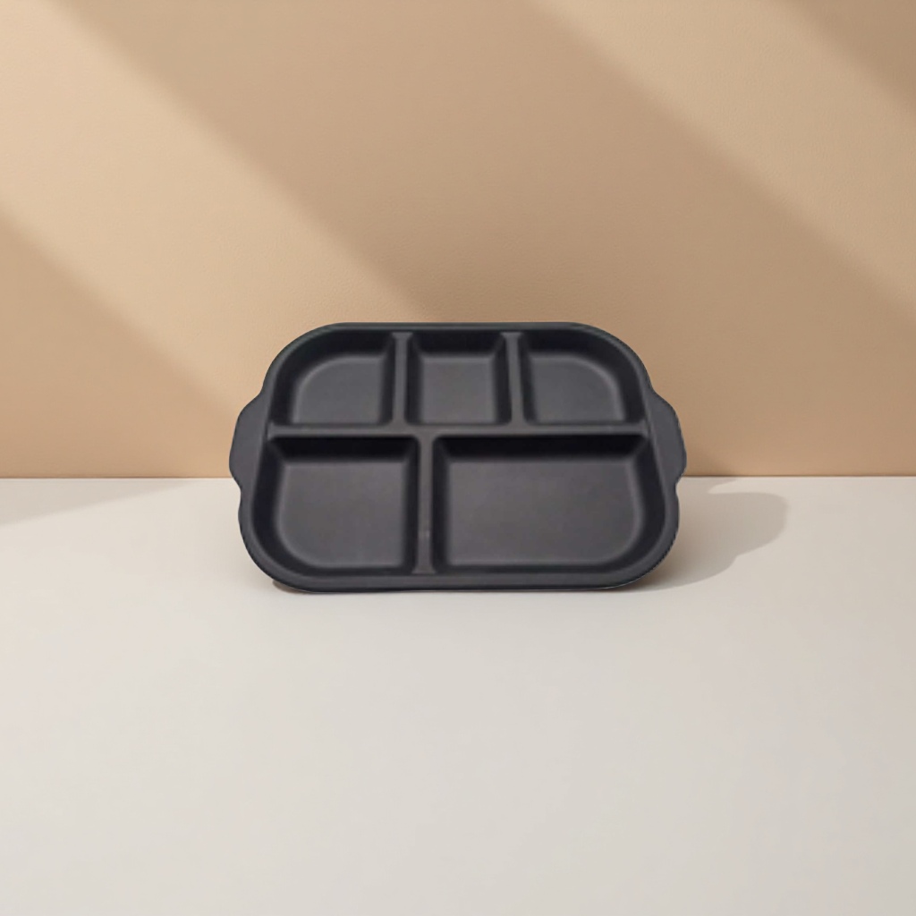 Black compartments dinner plate for home use, large water-draining and anti-slip ceramic dining table Application Scenario
